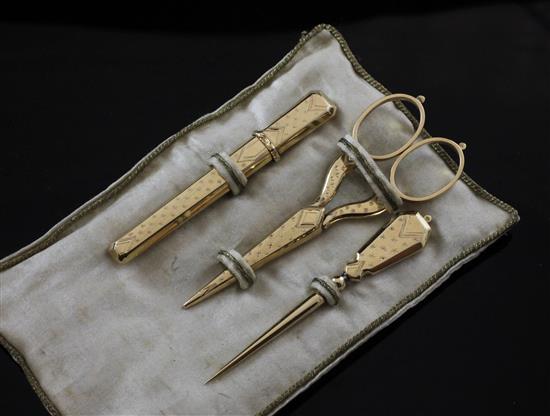 An early 20th century Dutch 583 standard gold sewing necessaire, scissors 3.25in.